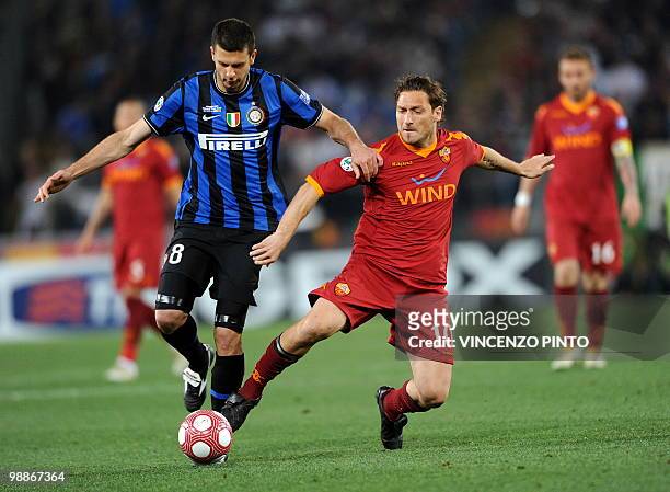 Roma's forward Francesco Totti vies Inter Milan's Brazilian midfielder Thiago Motta during their Coppa Italia final on May 5, 2010 at Olimpico...