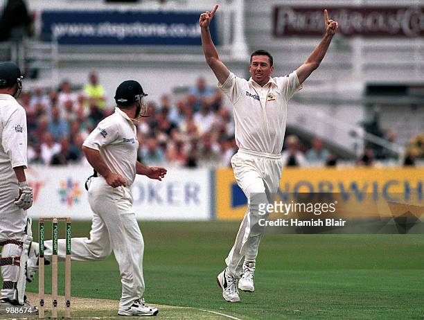 Glenn McGrath of Australia celebrates the early wicket of Michael Atherton of England during the first day of the Npower Third Test match between...
