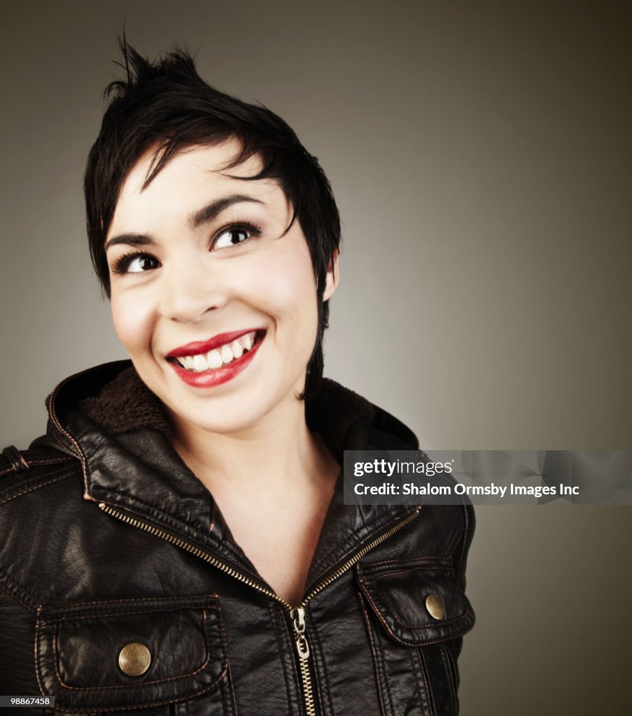 Latin American woman wearing leather jacket