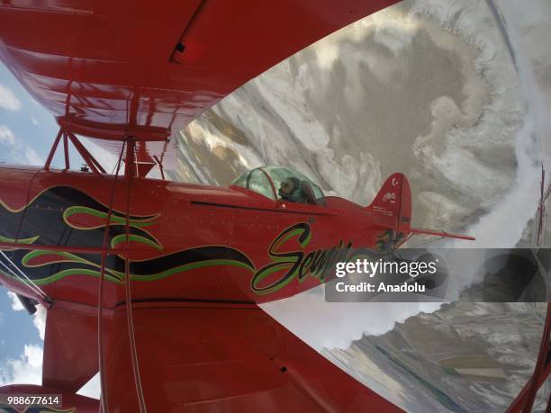 Semin Ozturk, Turkey's first professional female aerobatic pilot performs a demonstration flight with her 'Pitts S2-B' plane that has Lycoming engine...