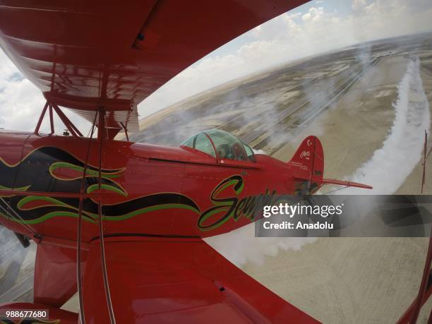 Semin Ozturk, Turkey's first professional female aerobatic pilot performs a demonstration flight with her 'Pitts S2-B' plane that has Lycoming engine...