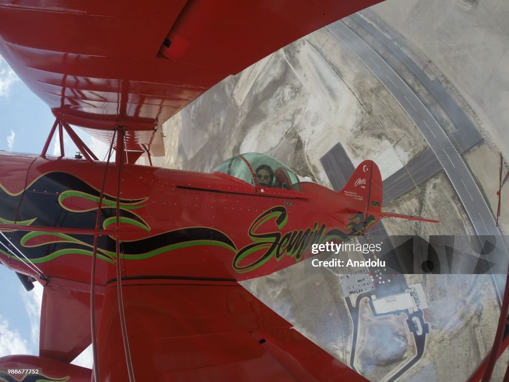 Turkey's first female aerobatic pilot, Semin Ozturk attends the Aeromania Airshow