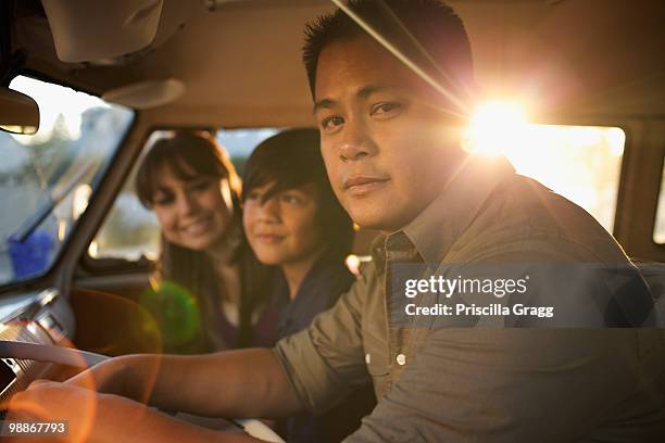 family riding in van together - coronado island 個照片及圖片檔