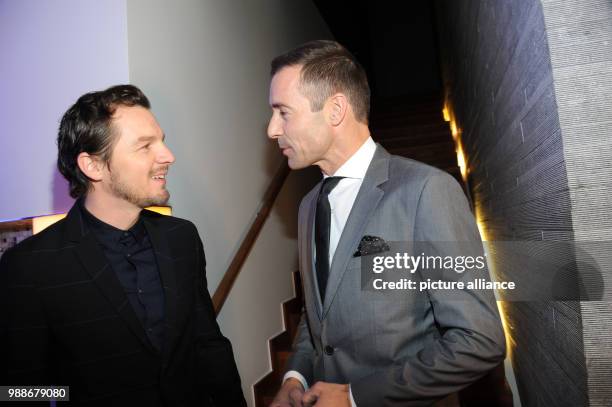 The actor Felix Klare in conversation with TV presenter Kai Pflaume during the traditional Advent meal of the ARD at the Bayerischer Hof in Munich,...