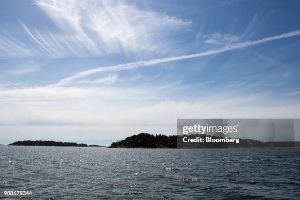 SuperShe island, right, sits in the Baltic sea near Raasepori, Finland, on Wednesday, June 27, 2018. The price of experimental networking on the...