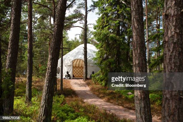 The yoga yurt stands among trees on SuperShe island near Raasepori, Finland, on Wednesday, June 27, 2018. The price of experimental networking on the...