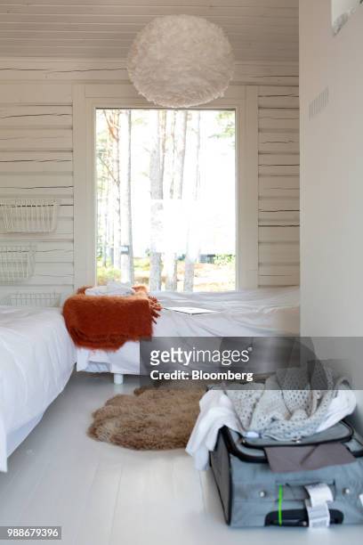 Beds sit in a guest cabin on SuperShe island near Raasepori, Finland, on Wednesday, June 27, 2018. The price of experimental networking on the island...