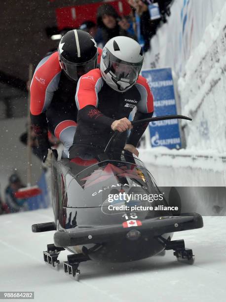 Canadian bobsleigh athletes Nick Poloniato and Lascelles Brown in action during the men's two person bob event at the BMW IBSF World Cup in...