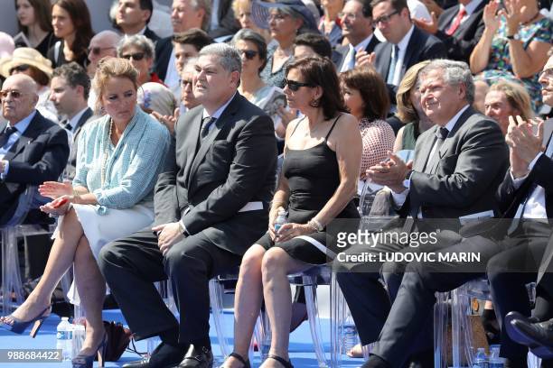 The sons of late French politician and Holocaust survivor Simone Veil, Pierre-Francois and his wife Barbara Rosnay and Jean Veil and his wife...