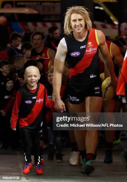 Dyson Heppell of the Bombers walks up the race during the 2018 AFL round15 match between the Essendon Bombers and the North Melbourne Kangaroos at...