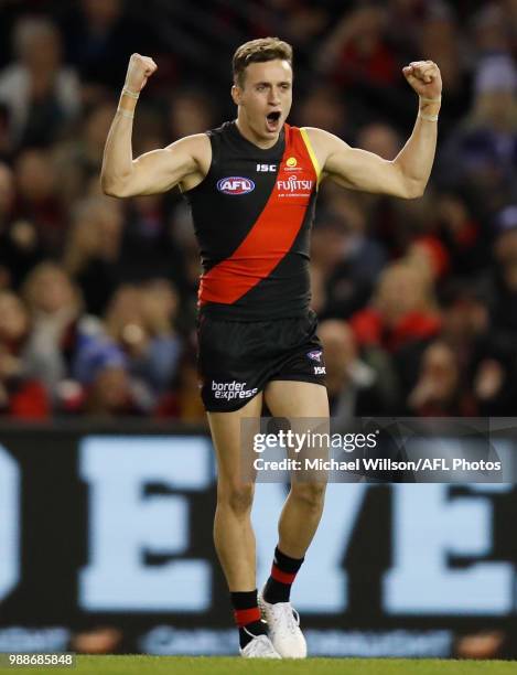 Orazio Fantasia of the Bombers celebrates a goal during the 2018 AFL round15 match between the Essendon Bombers and the North Melbourne Kangaroos at...