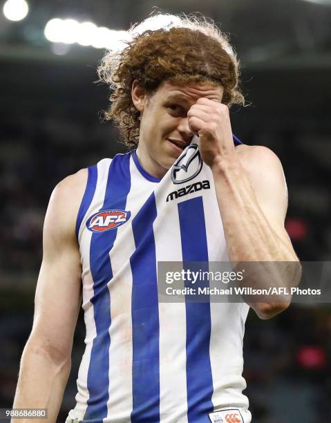 Ben Brown of the Kangaroos looks dejected after a loss during the 2018 AFL round15 match between the Essendon Bombers and the North Melbourne...