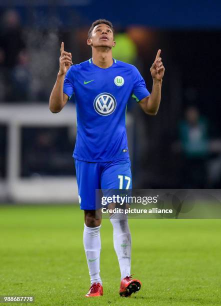 Wolfburg's Felix Uduokhai celebrates after the final whistle during the German Bundesliga football match between Hamburg SV and VfL Wolfsburg at the...