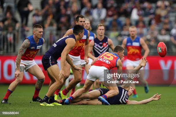 Nathan Fyfe of the Dockers contests for the ball during the round 15 AFL match between the Fremantle Dockers and the Brisbane Lions at Optus Stadium...