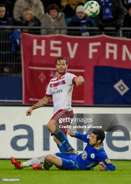 Hamburg's Dennis Diekmeier and Wolfburg's William vie for the ball during the German Bundesliga football match between Hamburg SV and VfL Wolfsburg...