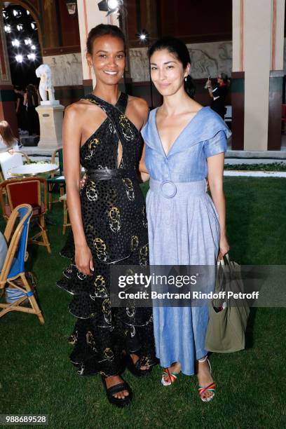 Model Liya Kebede and Caroline Issa attend the Sonia Rykiel - Paris Fashion Week - Haute Couture Fall/Winter 2018-2019 at Les Beaux-Arts de Paris on...