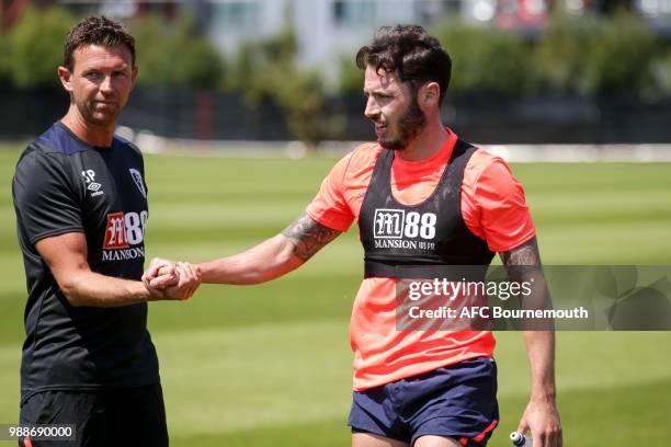 Bournemouth coach Stephen Purches with Adam Smith of Bournemouth during a series of fitness tests, ahead of the 2018-19 Premier League season, on...