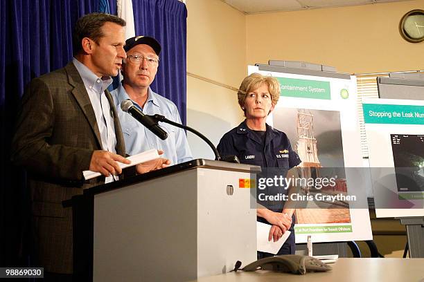 Chief Operating Officer Doug Suttles speaks as Interior Secretary Ken Salazar and US Coast Guard Rear Admiral Mary Landry listen during a press...