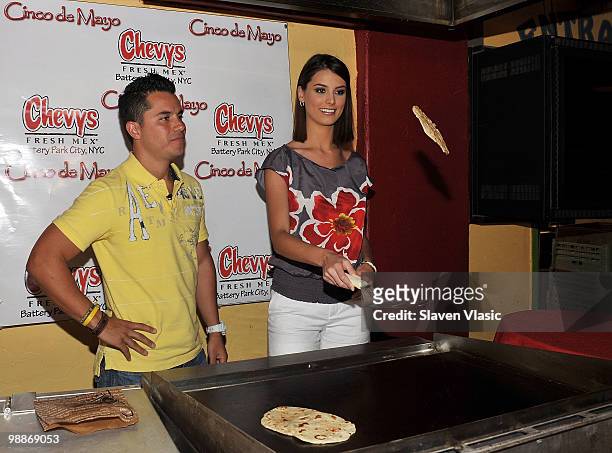 Karim Mendiburo of Telemundo Network's "Titulares Y Mas" and Miss Universe Stefania Fernandez celebrate Cinco de Mayo at Chevy's on May 5, 2010 in...