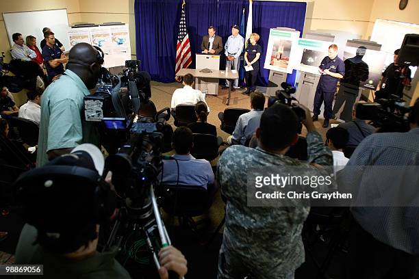 Chief Operating Officer Doug Suttles speaks as Interior Secretary Ken Salazar and US Coast Guard Rear Admiral Mary Landry listen during a press...