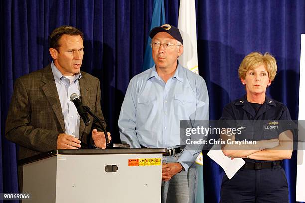 Chief Operating Officer Doug Suttles speaks as Interior Secretary Ken Salazar and US Coast Guard Rear Admiral Mary Landry listen during a press...