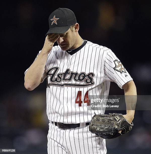 Pitcher Roy Oswalt of the Houston Astros throws against the Arizona Diamondbacks on May 4, 2010 in Houston, Texas. Arizona won 1-0.