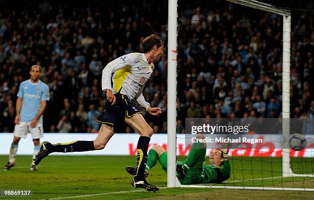 Peter Crouch of Tottenham Hotspur celebrates scoring the opening goal during the Barclays Premier League match between Manchester City and Tottenham...