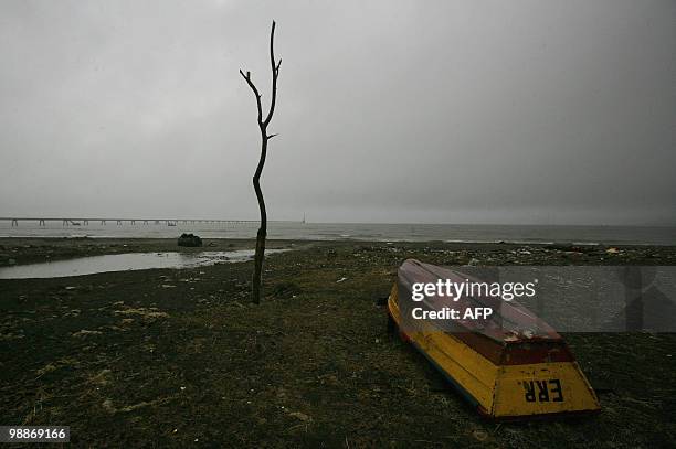 View of the devasted Penco's port in Concepcion, some 500 km south of Santiago May 5, 2010. The first autumn rains Wednesday flooded several...