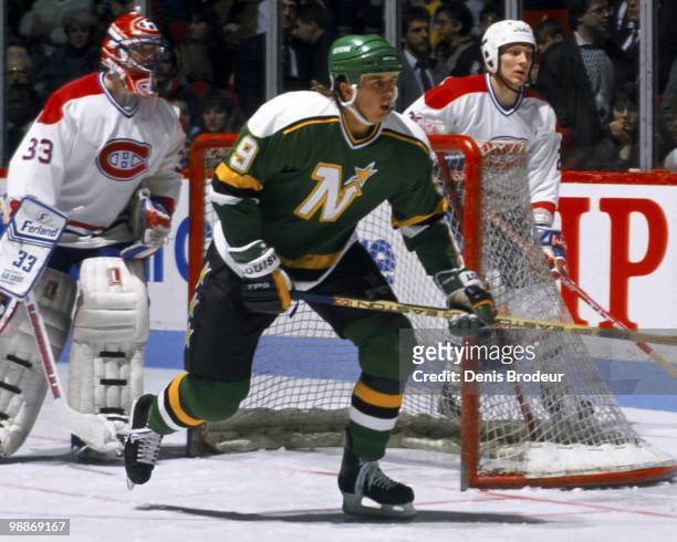Mike Modano of the Minnesota North Stars skates against the Montreal Canadiens during the early 1990's at the Montreal Forum in Montreal, Quebec,...