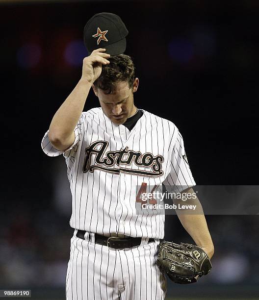 Pitcher Roy Oswalt of the Houston Astros throws against the Arizona Diamondbacks on May 4, 2010 in Houston, Texas. Arizona won 1-0.