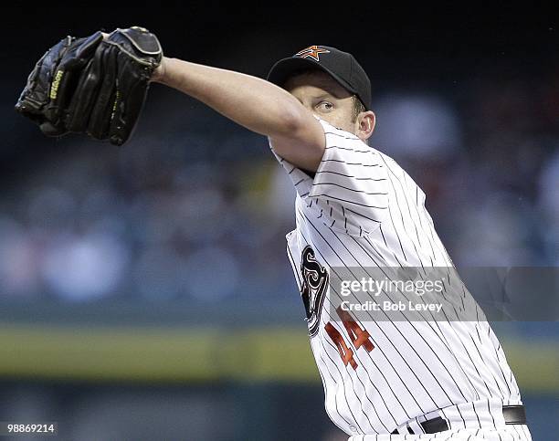 Pitcher Roy Oswalt of the Houston Astros throws against the Arizona Diamondbacks on May 4, 2010 in Houston, Texas. Arizona won 1-0.