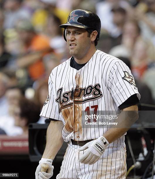 Lance Berkman of the Houston Astros waits on deck against the Arizona Diamondbacks at Minute Maid Park on May 4, 2010 in Houston, Texas.