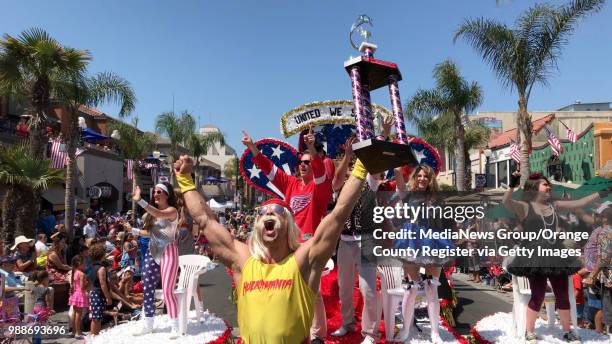 Performers on the Identifibo.com float re-enacting the parade scene from Ferris Bueller's Day with a Hulk Hogan actor during the 113th annual...