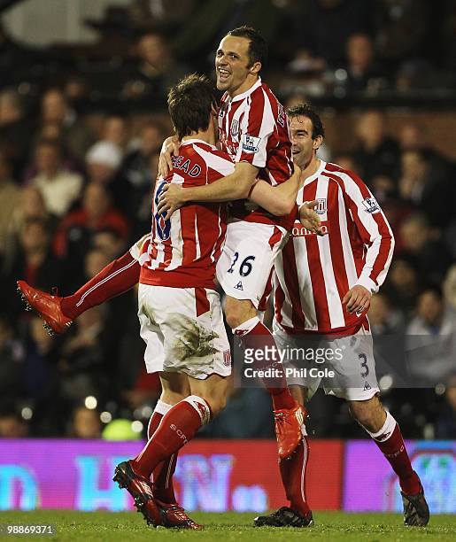 Matthew Etherington of Stoke City celebrates with Dean Whitehead and Danny Higginbotham as he scores their first goal during the Barclays Premier...
