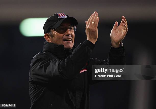 Tony Pulis manager of Stoke City applauds the travelling fans after the Barclays Premier League match between Fulham and Stoke City at Craven Cottage...