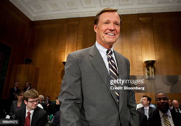 Christopher Cox, former chairman of the U.S. Securities and Exchange Commission , arrives to testify at a Financial Crisis Inquiry Commission hearing...