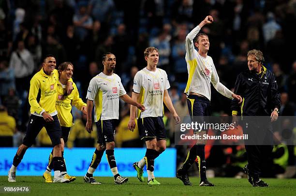 Peter Crouch of Tottenham Hotspur celebrates with his team mates at the end of the Barclays Premier League match between Manchester City and...