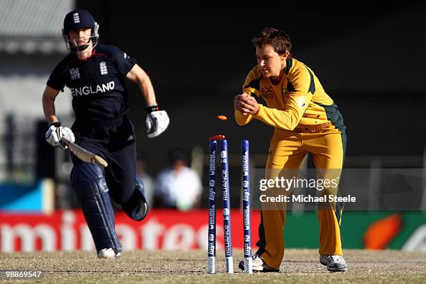 Shelley Nitschke of Australia runs out Beth Morgan from the final delivery in a 'one over game off', both sides finished on 7 runs but Australia won...
