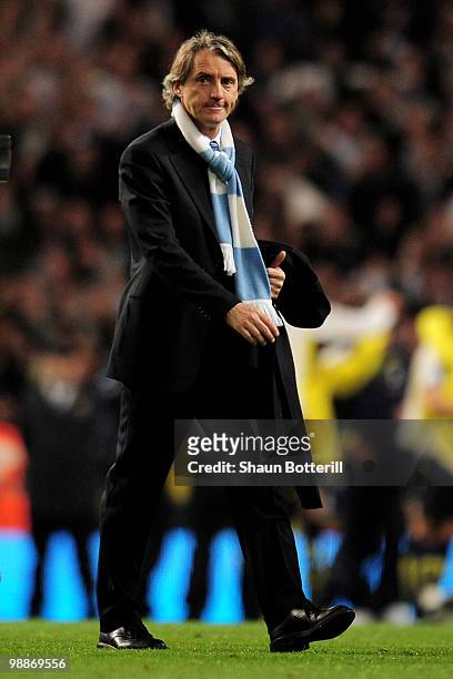 Manchester City Manager Roberto Mancini heads for the dressing room at the end of the Barclays Premier League match between Manchester City and...