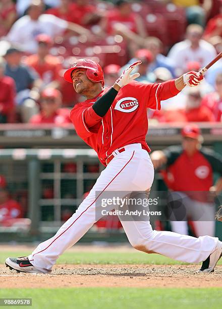 Orlando Cabrera of the Cincinnati Reds hits the game winning home in the 10th inning against the New York Mets on May 5, 2010 at Great American...