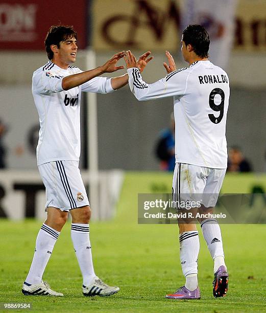 Cristiano Ronaldo of Real Madrid celebrates with Kaka during the La Liga match between Mallorca and Real Madrid at Ono Estadi on May 5, 2010 in...