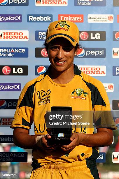 Lisa Sthalekar of Australia receives the player of the match during the ICC T20 Women's World Cup Group A match between England and Australia at...