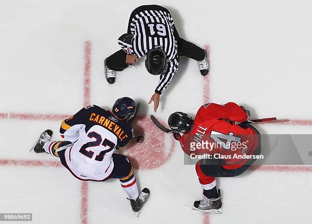 Taylor Hall of the Windsor Spitfires takes a faceoff against Taylor Carnevale of the Barrie Colts in the 4th game of the OHL Championship Final on...