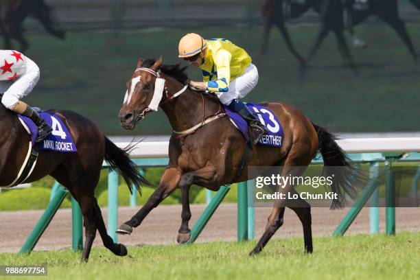 Jockey Hugh Bowman riding Hong Kong runner Werther finishes 2nd during the Takarazuka Kinen at Hanshin Racecourse on June 24, 2018 in Takarazuka,...