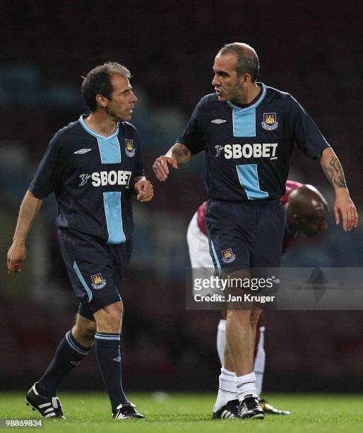 Gianfranco Zola, Manager of West Ham United and Paolo Di Canio talk together during the Tony Carr Testimonial match between the Academy All-Stars and...