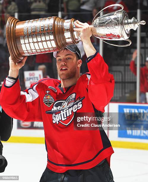 Taylor Hall of the Windsor Spitfires hoists the Robertson Cup after the 4th game of the OHL Championship Final against the Barrie Colts on May 4,2010...