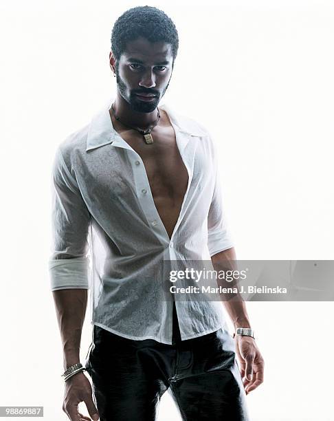 Singer Eric Benet poses at a portrait session for Vibe Magazine in 2006.