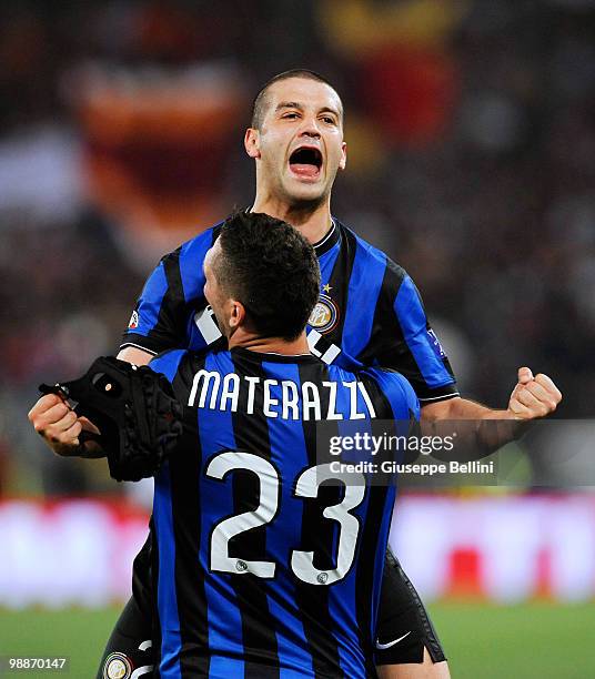 Marco Materazzi and Cristian Chivu of Inter celebrate victory after the Tim Cup match between FC Internazionale Milano and AS Roma at Stadio Olimpico...