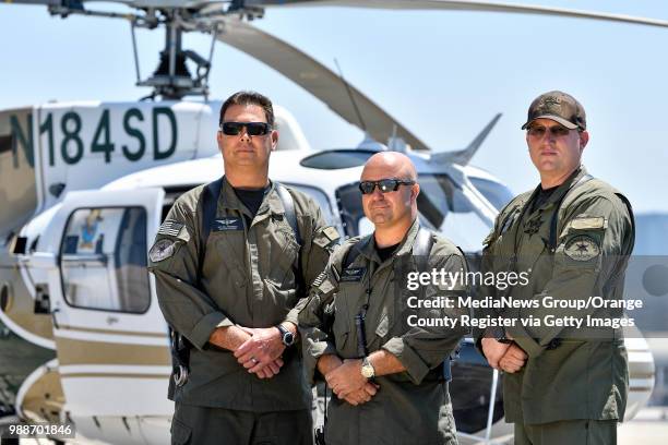 Sgt. Bill Fitzgerald, Operations Sergeant for the Aviation Support Unit, Deputy Brian Stockbridge, tactical flight officer, and Deputy Brian Fischer,...