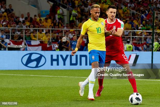 Neymar Jr of Brazil competes for the ball with Antonio Rukavina of Serbia during the 2018 FIFA World Cup Russia group E match between Serbia and...